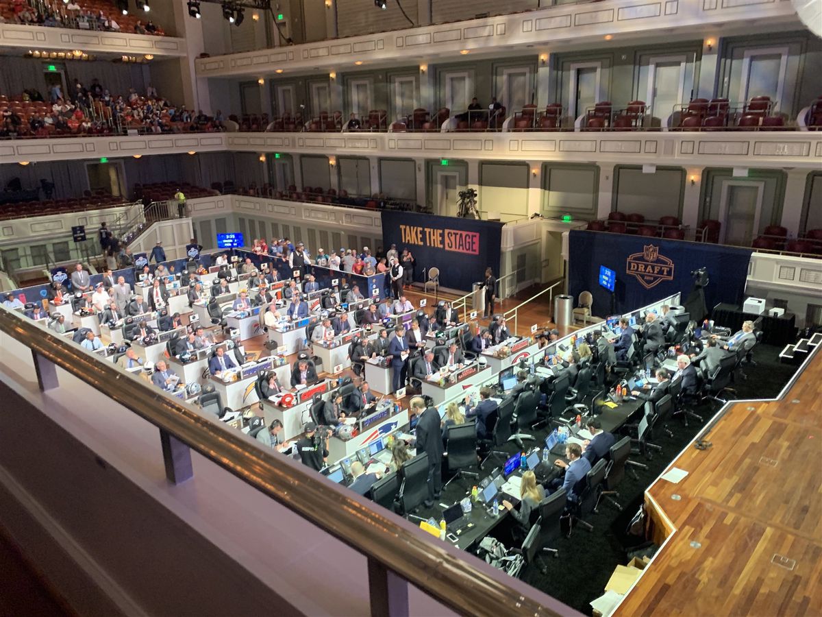 Team tables on the 2019 NFL Draft floor in Nashville, each wired for phones and data